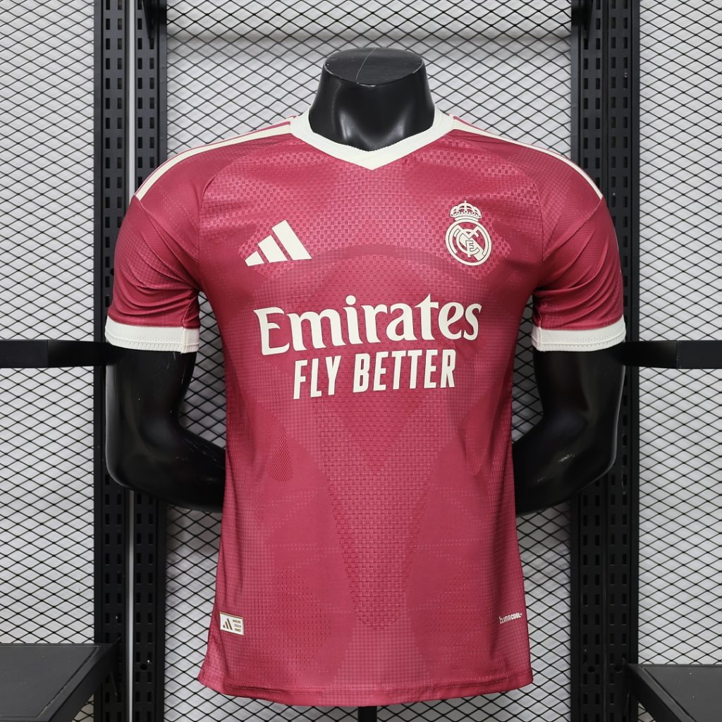 Camiseta tercera equipacion Real Madrid rosa 2026-2027 versión jugador