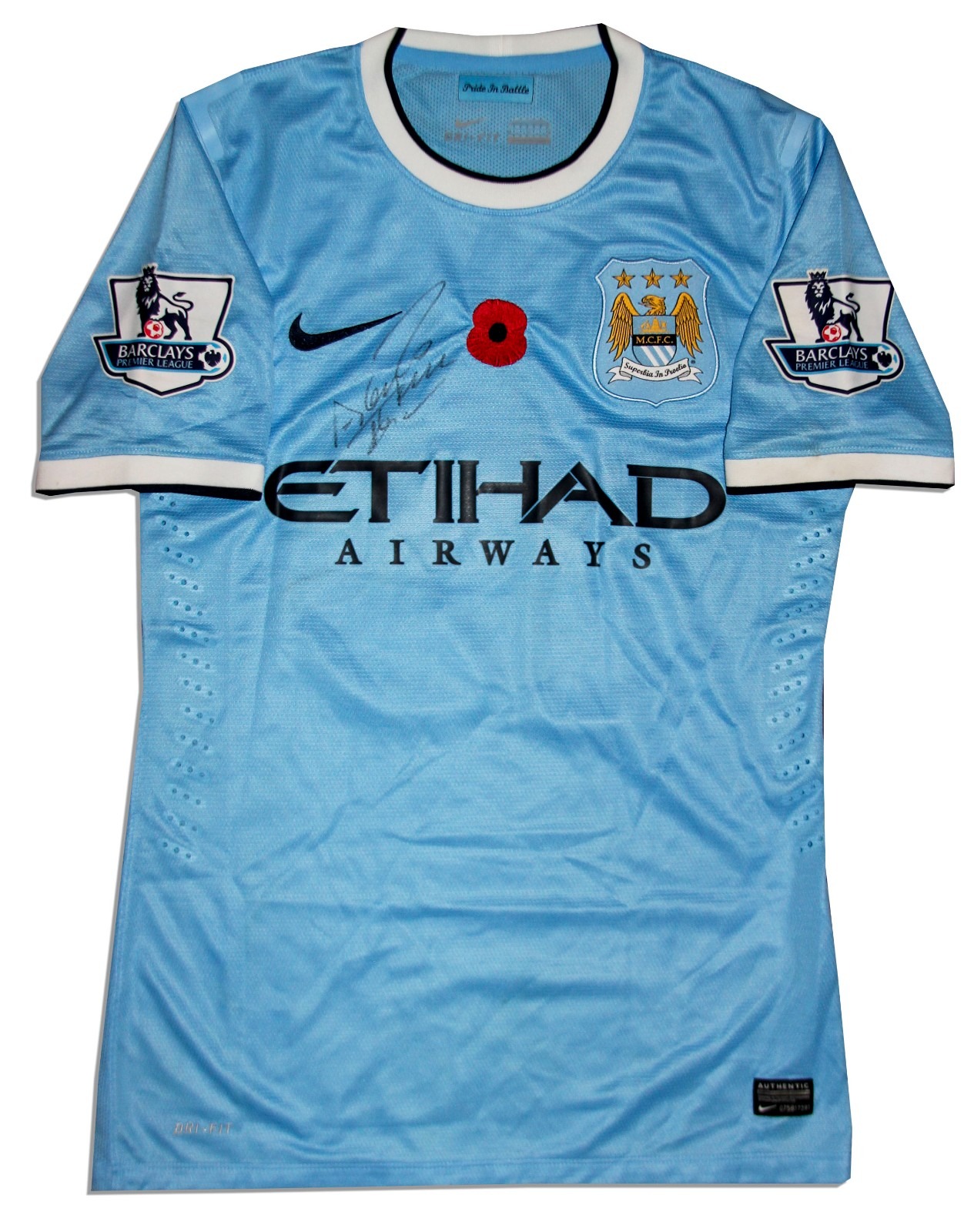 Primera equipación de Manchester City 13-14