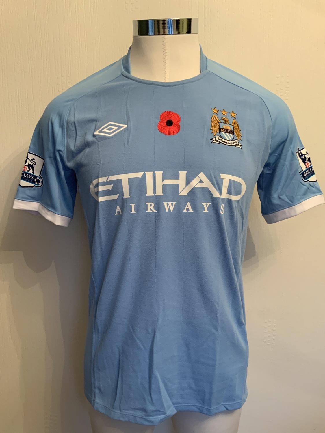 Primera equipación de Man City 10-11