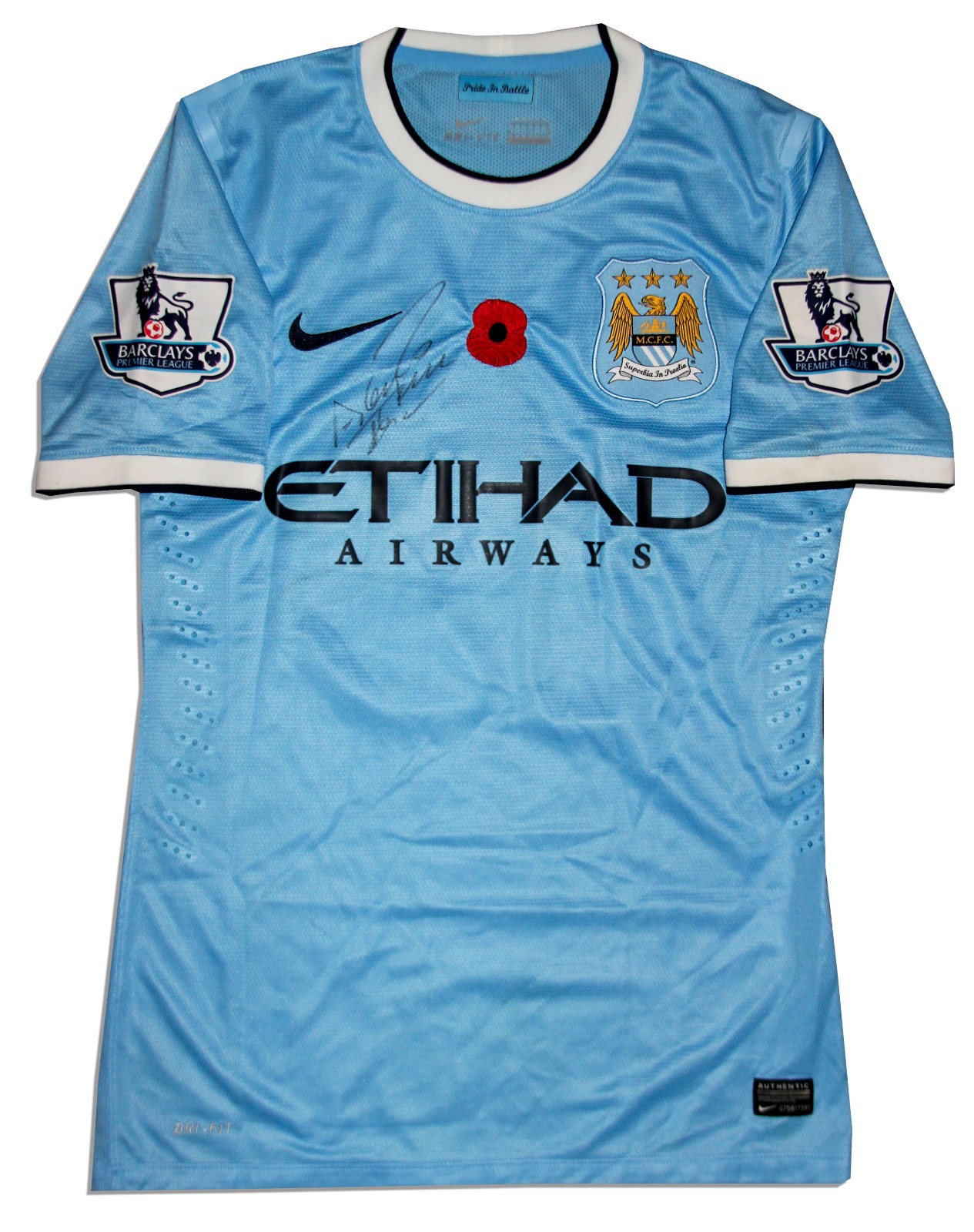 Primera equipación de Man City 13-14