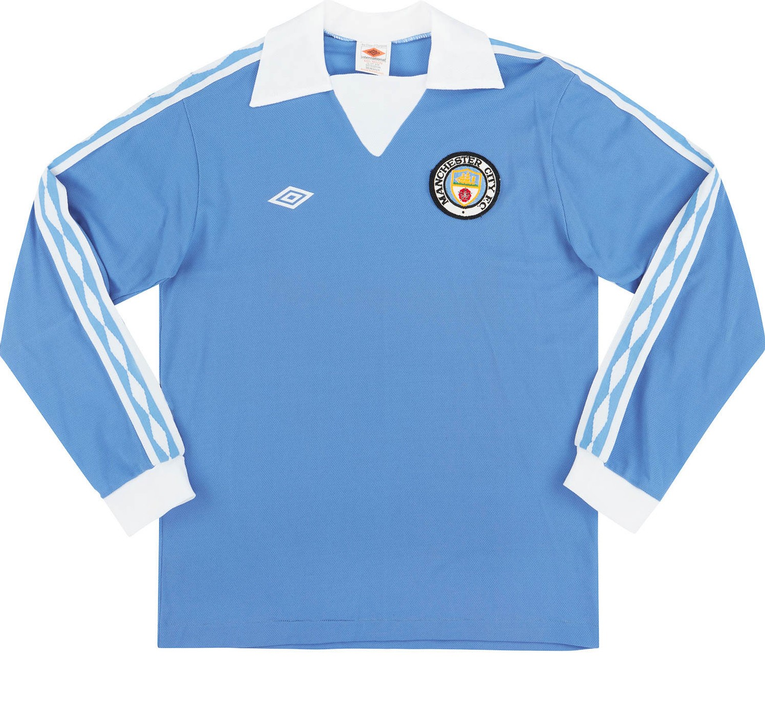 Primera equipación de Man City 75-76
