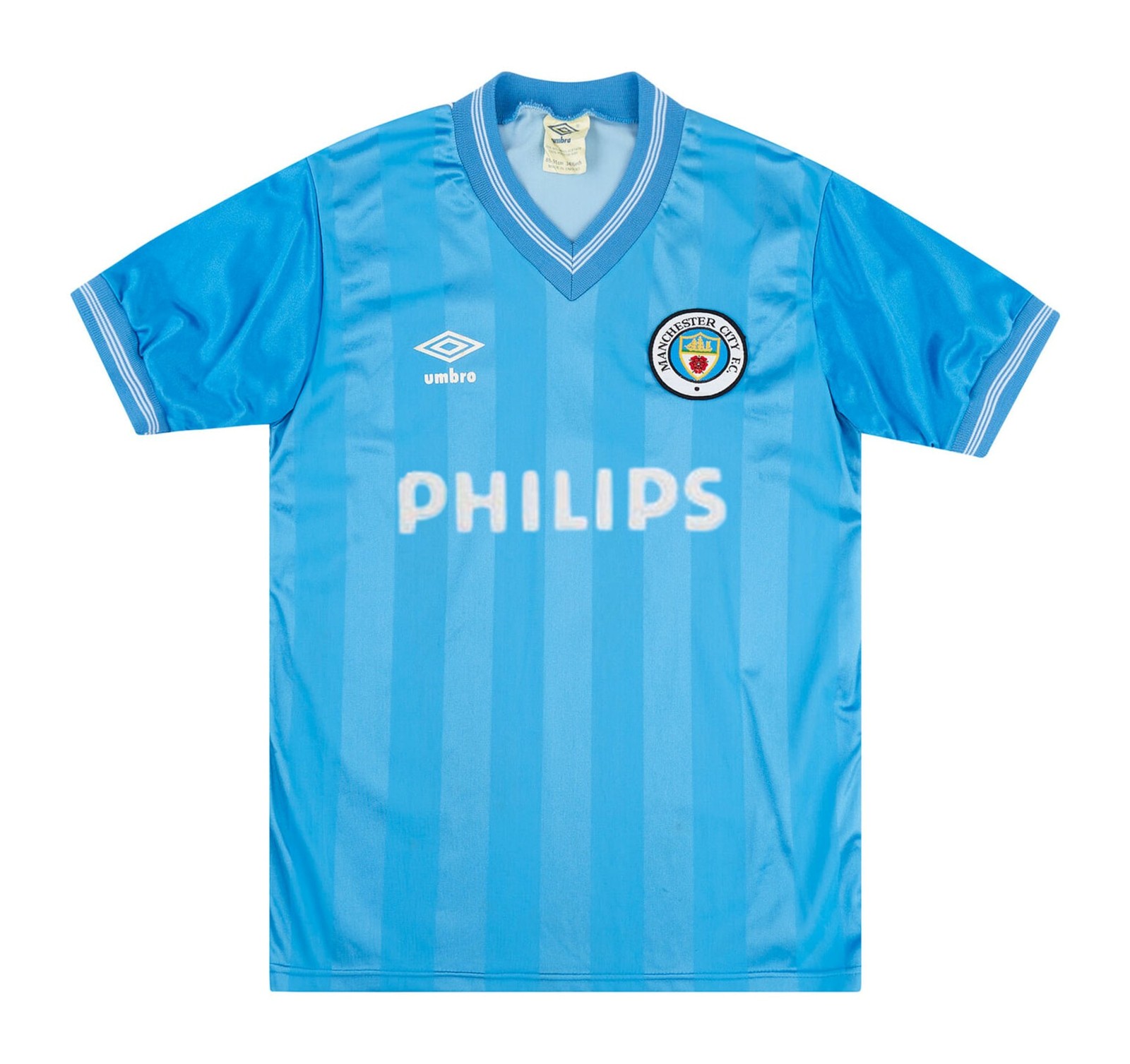 Primera equipación de Man City 84-85