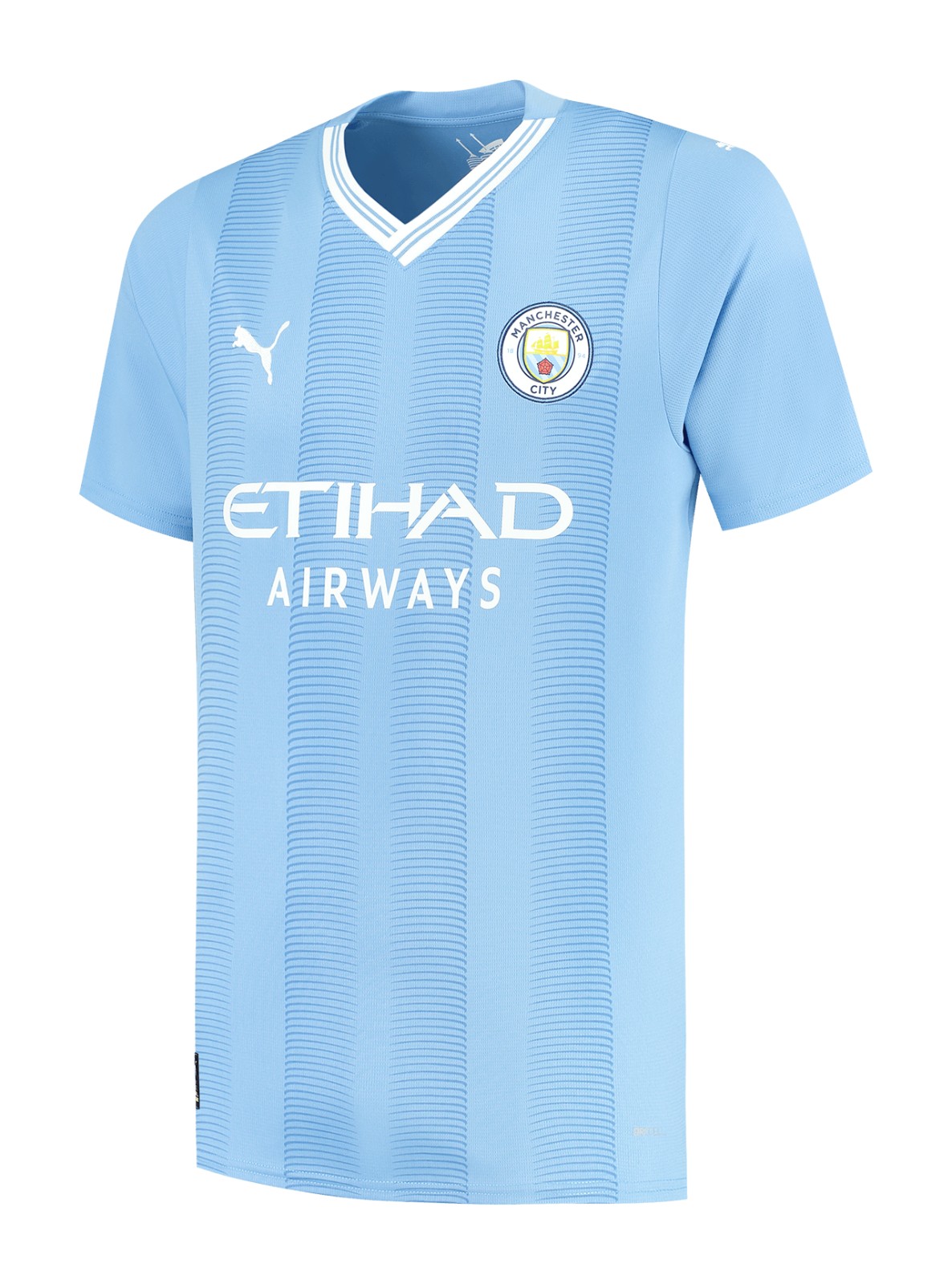 Primera equipación de Man City 23-24