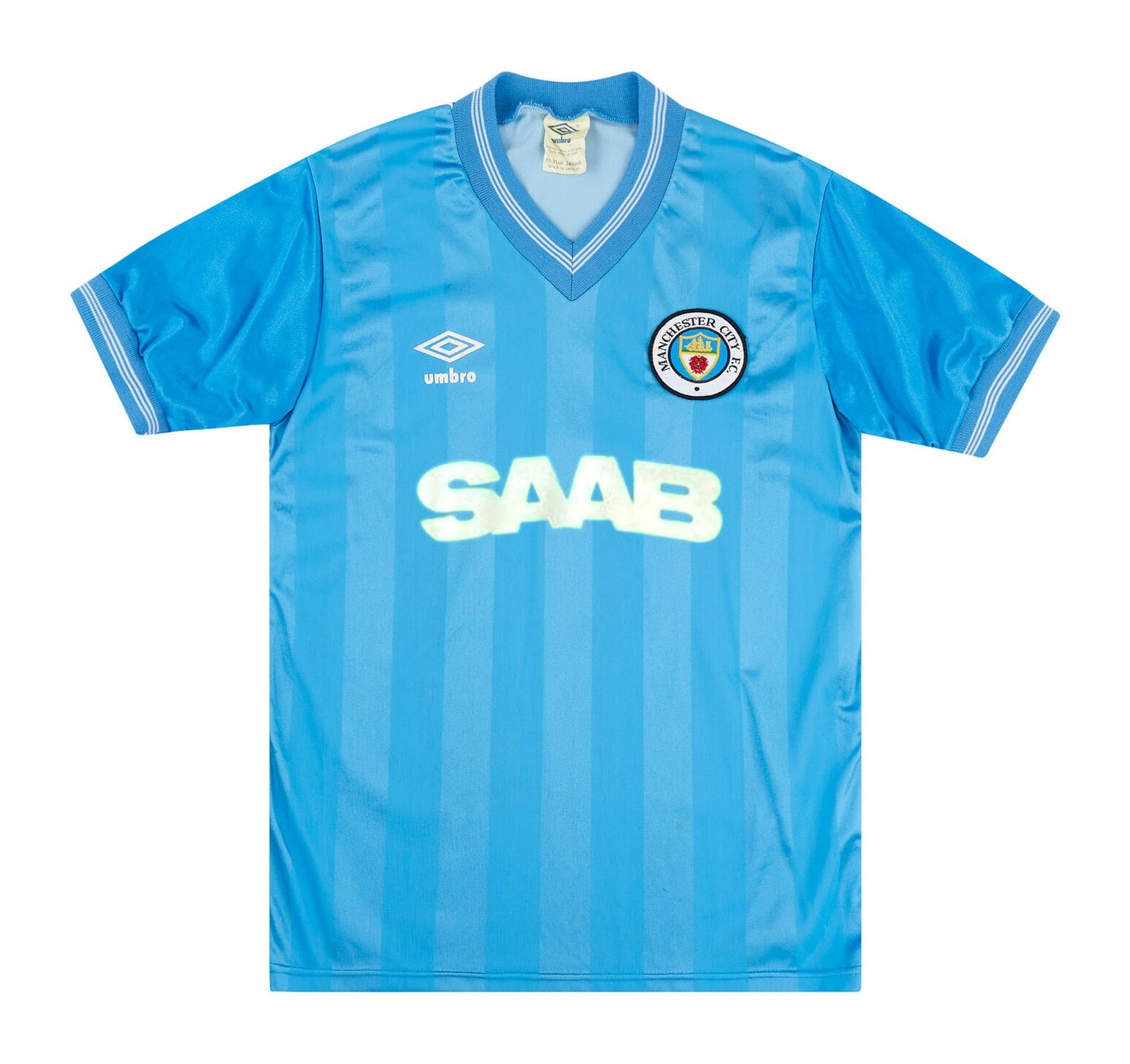Primera equipación de Man City 83-84